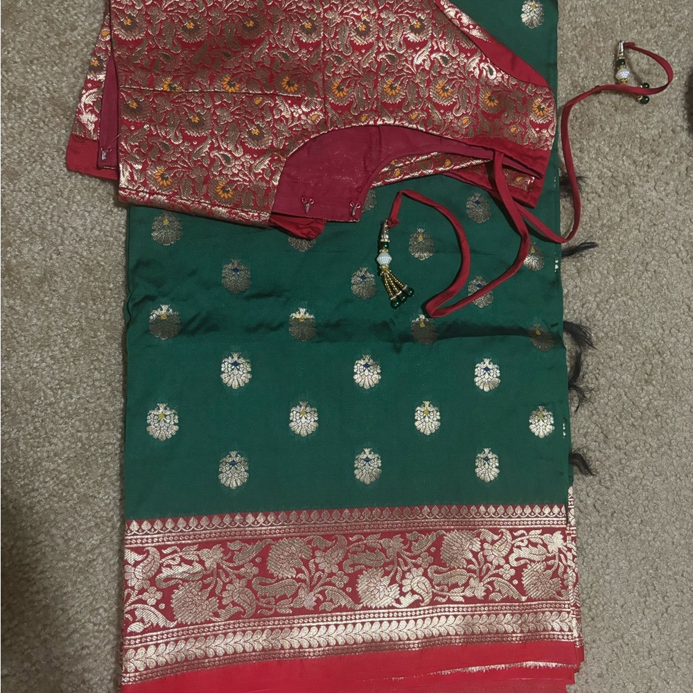 Elegant Green and Red Saree with Gold Accents